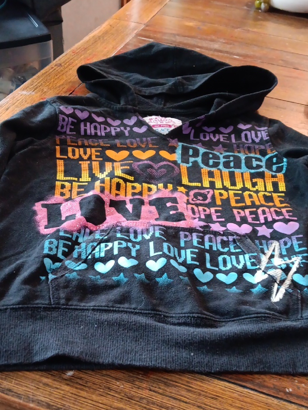 Place Black Hoodie with Pink and Teal Logo Accent